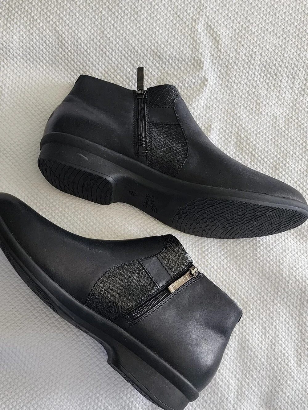 Dansko black leather ankle Boots with side buckle and textured panel